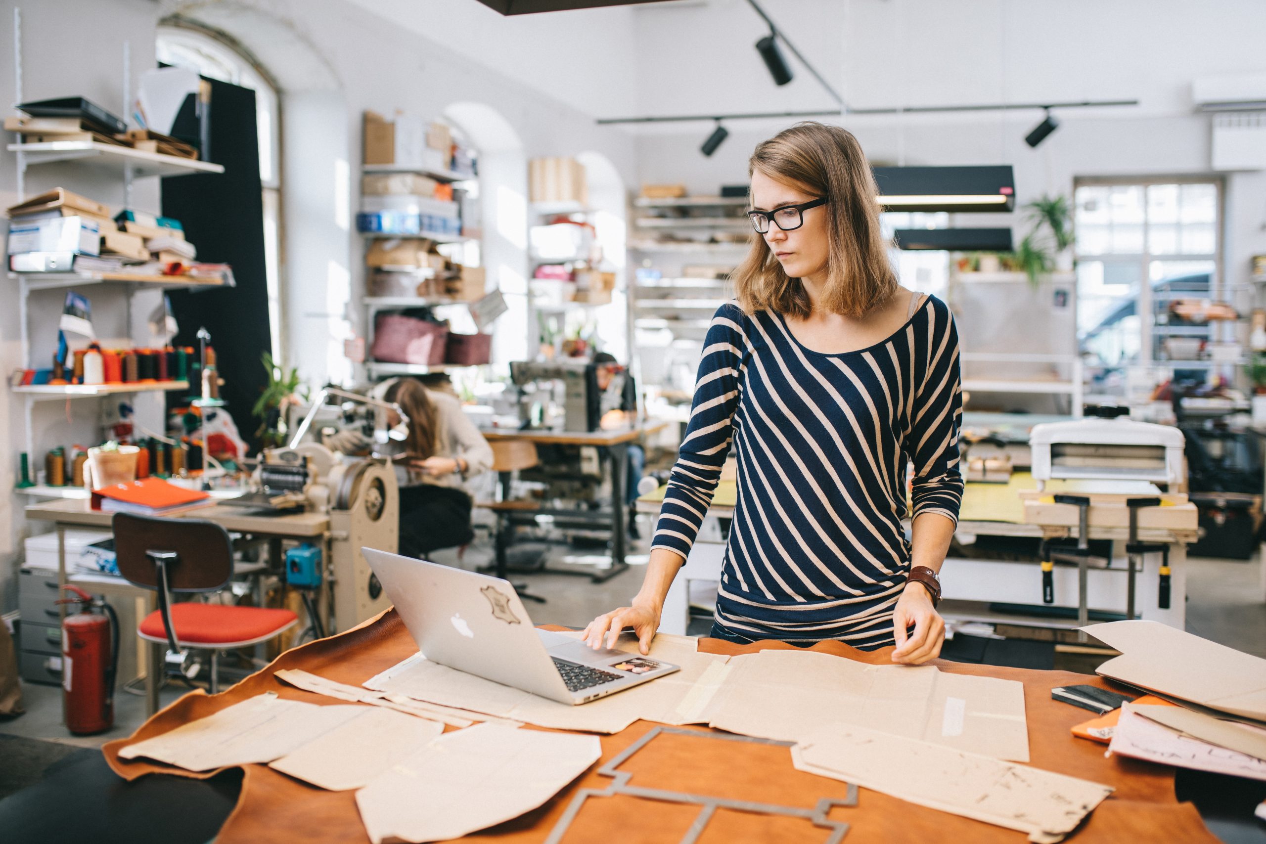 Manufacturer using just in time inventory management software to keep track of leather goods and materials